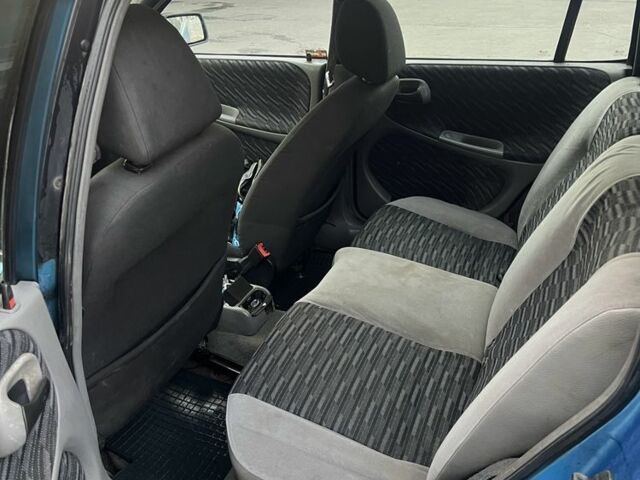 Синій Опель Астра, об'ємом двигуна 2 л та пробігом 250 тис. км за 597 $, фото 8 на Automoto.ua