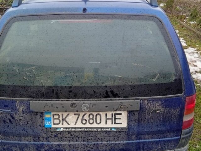 Синий Опель Астра, объемом двигателя 1.8 л и пробегом 300 тыс. км за 1050 $, фото 4 на Automoto.ua