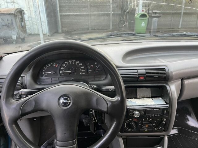 Синій Опель Астра, об'ємом двигуна 2 л та пробігом 250 тис. км за 597 $, фото 7 на Automoto.ua