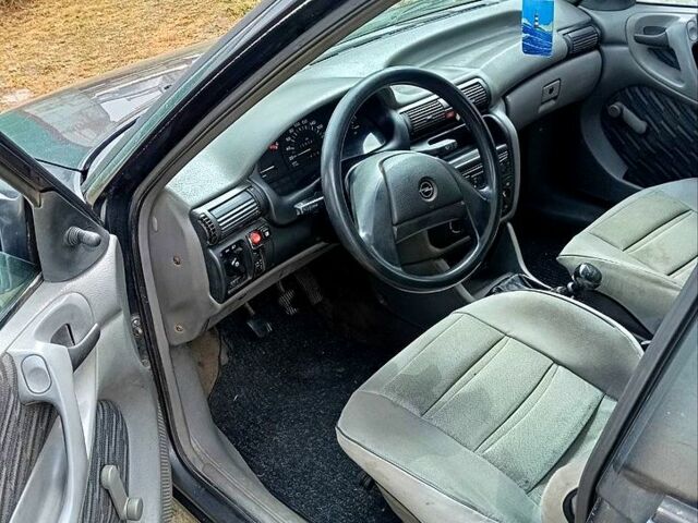 Синій Опель Астра, об'ємом двигуна 17 л та пробігом 430 тис. км за 1600 $, фото 5 на Automoto.ua