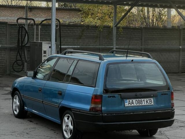 Синій Опель Астра, об'ємом двигуна 2 л та пробігом 250 тис. км за 597 $, фото 2 на Automoto.ua