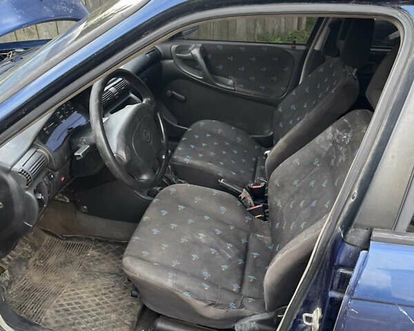 Синий Опель Астра, объемом двигателя 1.6 л и пробегом 200 тыс. км за 1650 $, фото 7 на Automoto.ua