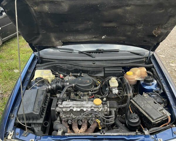 Синий Опель Астра, объемом двигателя 1.6 л и пробегом 200 тыс. км за 1650 $, фото 6 на Automoto.ua