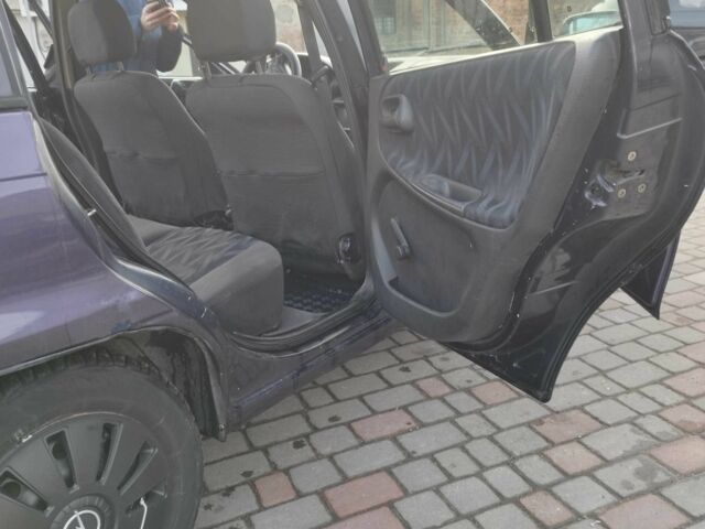 Синий Опель Астра, объемом двигателя 1.7 л и пробегом 308 тыс. км за 2150 $, фото 7 на Automoto.ua