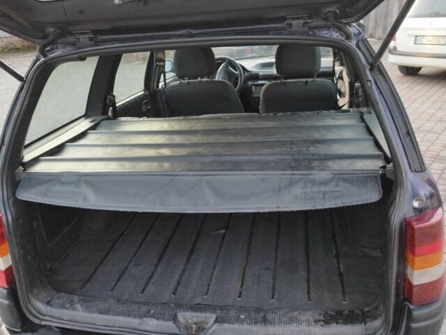 Синий Опель Астра, объемом двигателя 1.7 л и пробегом 308 тыс. км за 2150 $, фото 10 на Automoto.ua