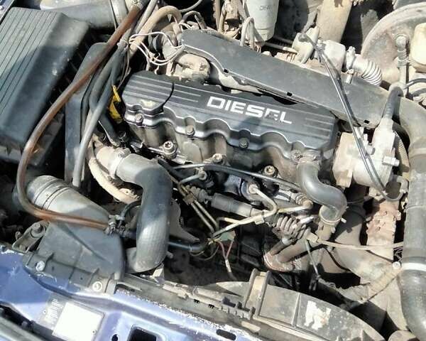 Синий Опель Астра, объемом двигателя 1.7 л и пробегом 377 тыс. км за 1350 $, фото 3 на Automoto.ua