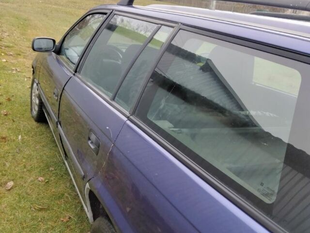 Синий Опель Астра, объемом двигателя 1.7 л и пробегом 377 тыс. км за 1350 $, фото 3 на Automoto.ua