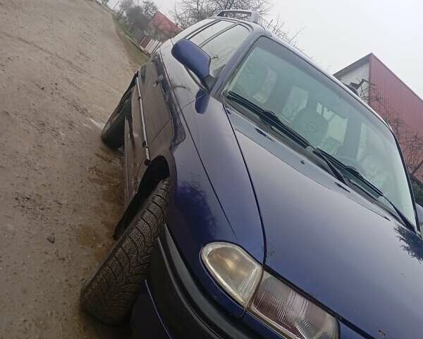 Синий Опель Астра, объемом двигателя 1.6 л и пробегом 278 тыс. км за 1550 $, фото 1 на Automoto.ua