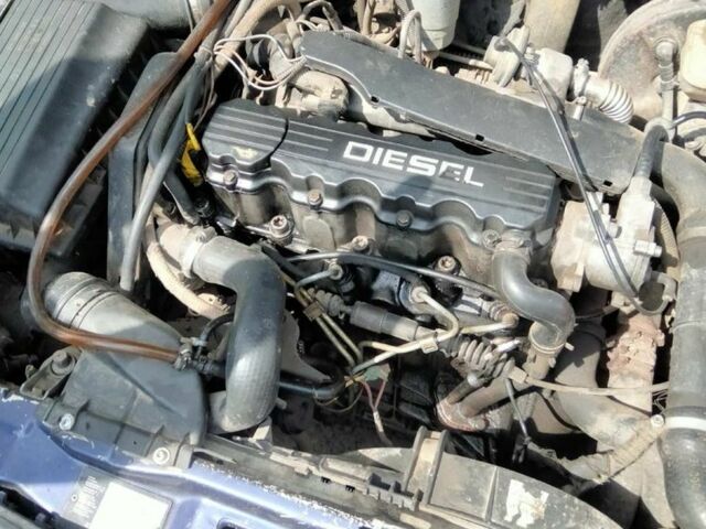 Синий Опель Астра, объемом двигателя 1.7 л и пробегом 377 тыс. км за 1350 $, фото 4 на Automoto.ua