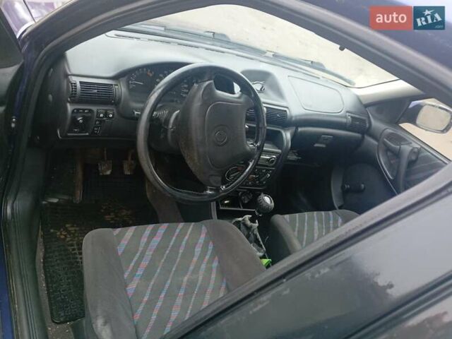 Синий Опель Астра, объемом двигателя 1.6 л и пробегом 278 тыс. км за 1550 $, фото 6 на Automoto.ua