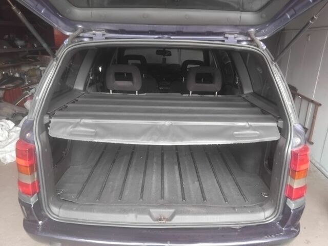 Синий Опель Астра, объемом двигателя 1.8 л и пробегом 264 тыс. км за 2350 $, фото 17 на Automoto.ua