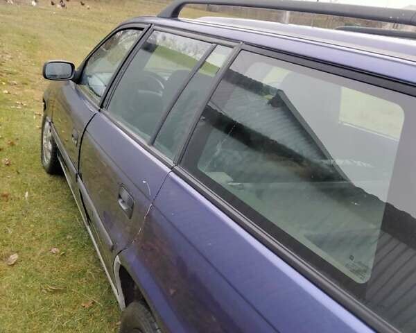 Синий Опель Астра, объемом двигателя 1.7 л и пробегом 377 тыс. км за 1350 $, фото 2 на Automoto.ua