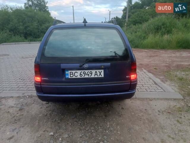 Синий Опель Астра, объемом двигателя 1.6 л и пробегом 374 тыс. км за 2100 $, фото 3 на Automoto.ua