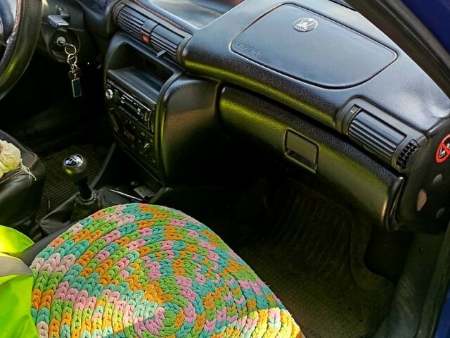 Синий Опель Астра, объемом двигателя 1.7 л и пробегом 300 тыс. км за 2200 $, фото 6 на Automoto.ua