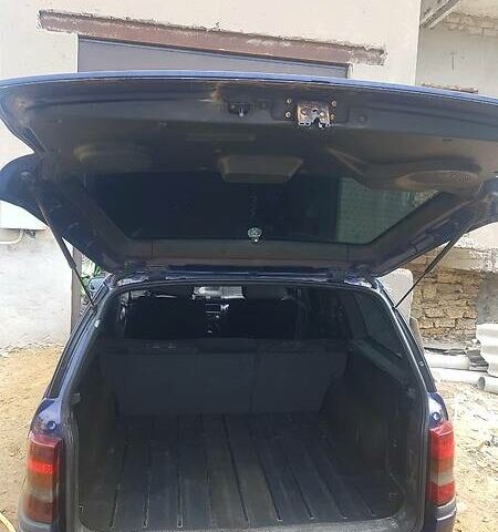 Синий Опель Астра, объемом двигателя 1.6 л и пробегом 244 тыс. км за 2100 $, фото 6 на Automoto.ua