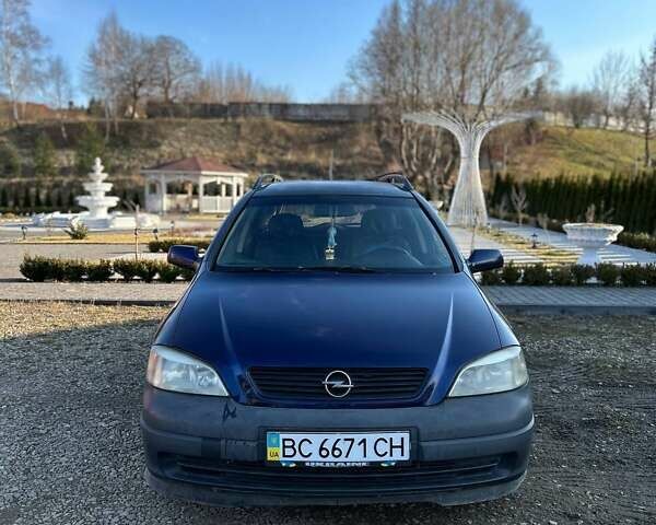 Синий Опель Астра, объемом двигателя 2 л и пробегом 395 тыс. км за 1600 $, фото 5 на Automoto.ua