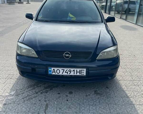 Синий Опель Астра, объемом двигателя 1.7 л и пробегом 370 тыс. км за 2100 $, фото 5 на Automoto.ua
