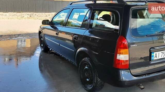 Синий Опель Астра, объемом двигателя 1.6 л и пробегом 390 тыс. км за 2395 $, фото 1 на Automoto.ua