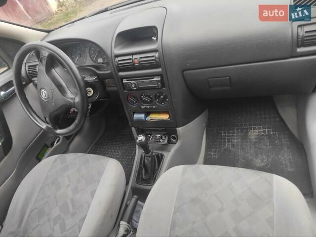 Синій Опель Астра, об'ємом двигуна 1.7 л та пробігом 270 тис. км за 1650 $, фото 9 на Automoto.ua