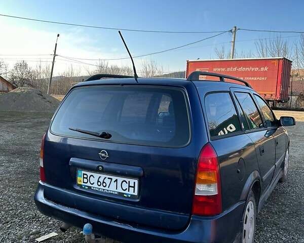 Синий Опель Астра, объемом двигателя 2 л и пробегом 395 тыс. км за 1600 $, фото 4 на Automoto.ua