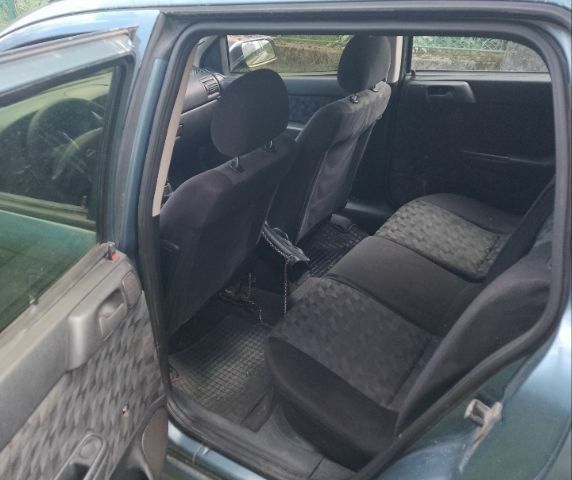 Синий Опель Астра, объемом двигателя 0 л и пробегом 400 тыс. км за 928 $, фото 4 на Automoto.ua