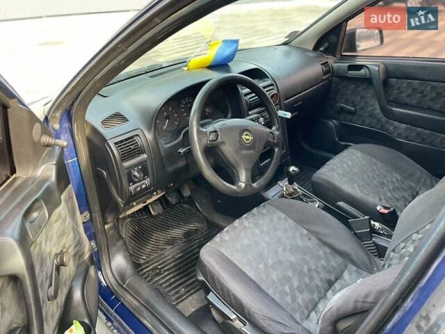 Синий Опель Астра, объемом двигателя 1.7 л и пробегом 370 тыс. км за 2100 $, фото 3 на Automoto.ua