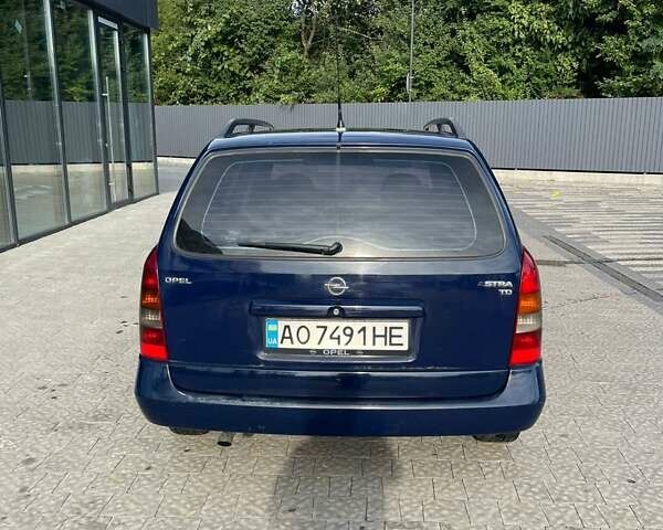 Синий Опель Астра, объемом двигателя 1.7 л и пробегом 370 тыс. км за 2100 $, фото 1 на Automoto.ua