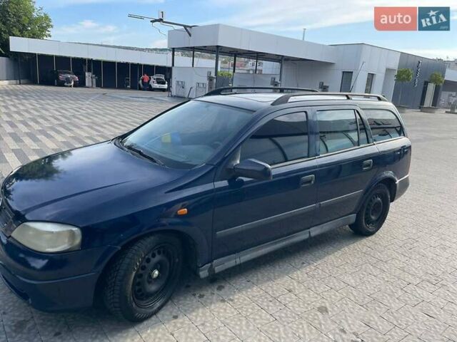 Синий Опель Астра, объемом двигателя 1.7 л и пробегом 370 тыс. км за 2100 $, фото 4 на Automoto.ua