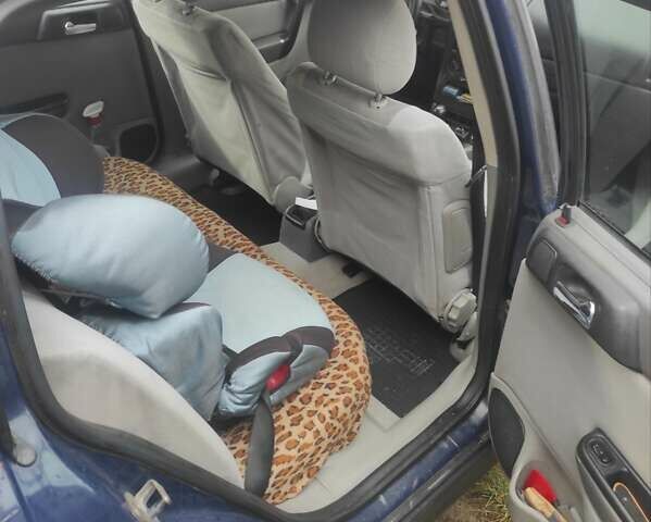 Синій Опель Астра, об'ємом двигуна 1.7 л та пробігом 270 тис. км за 1650 $, фото 4 на Automoto.ua