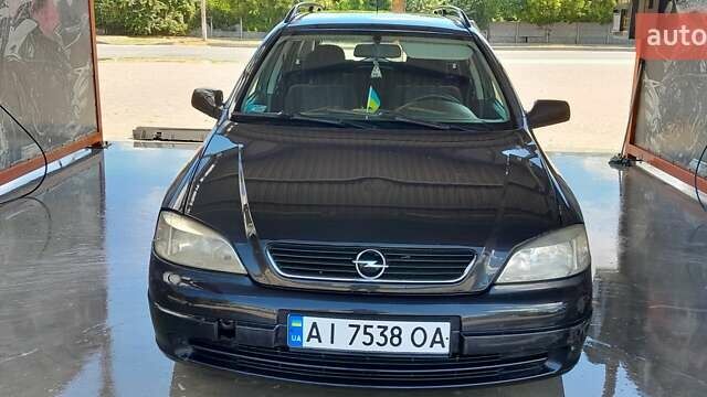 Синий Опель Астра, объемом двигателя 1.6 л и пробегом 390 тыс. км за 2395 $, фото 11 на Automoto.ua