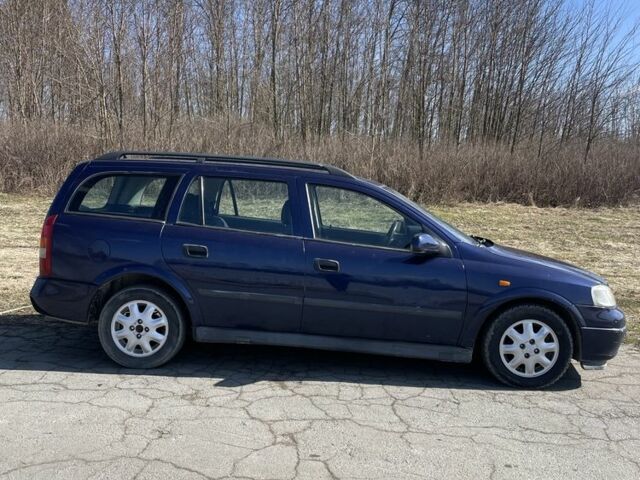 Синий Опель Астра, объемом двигателя 1.6 л и пробегом 320 тыс. км за 2200 $, фото 2 на Automoto.ua