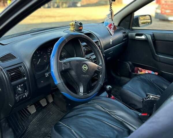 Синий Опель Астра, объемом двигателя 2 л и пробегом 395 тыс. км за 1600 $, фото 8 на Automoto.ua