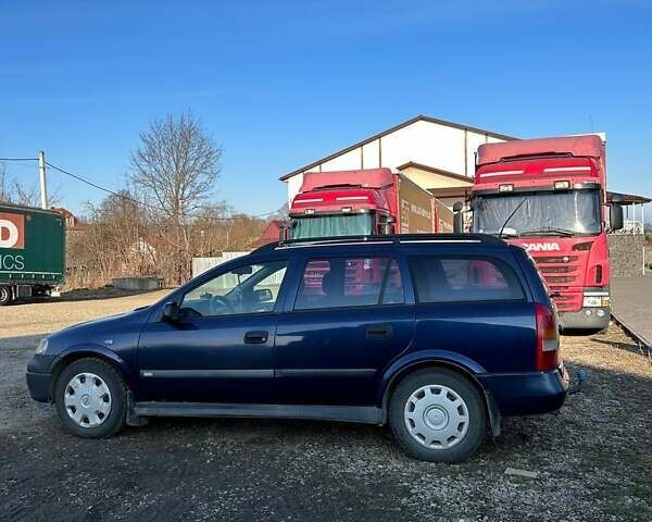 Синий Опель Астра, объемом двигателя 2 л и пробегом 395 тыс. км за 1600 $, фото 3 на Automoto.ua