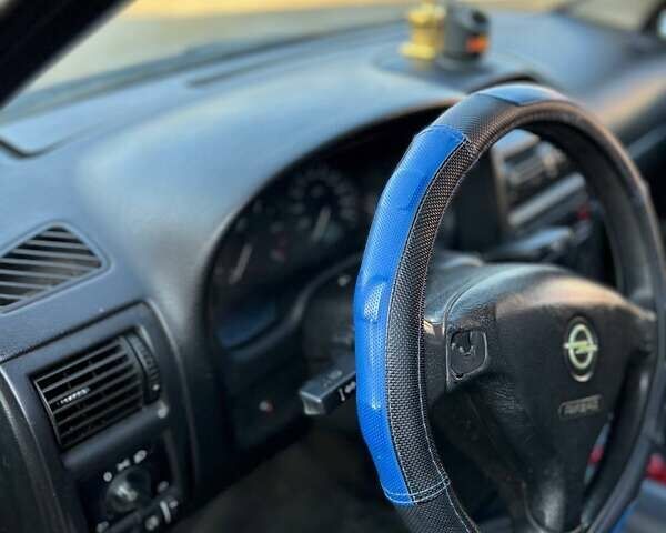Синий Опель Астра, объемом двигателя 2 л и пробегом 395 тыс. км за 1600 $, фото 7 на Automoto.ua