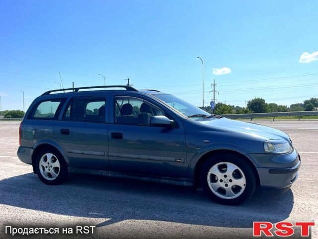 Синий Опель Астра, объемом двигателя 1.6 л и пробегом 303 тыс. км за 2900 $, фото 2 на Automoto.ua