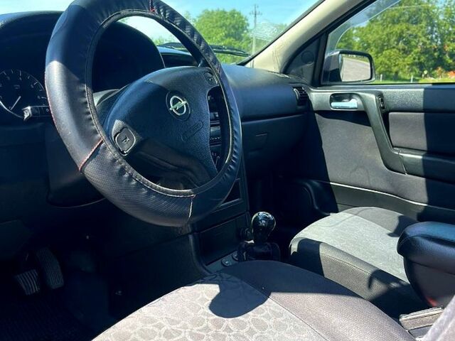 Синий Опель Астра, объемом двигателя 1.6 л и пробегом 303 тыс. км за 2900 $, фото 3 на Automoto.ua