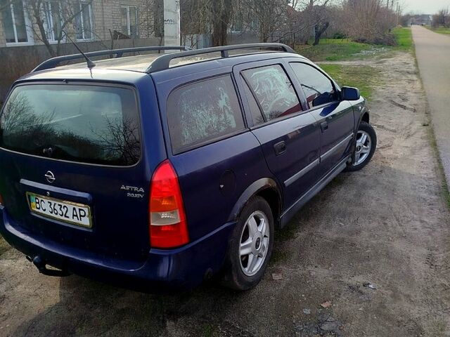 Синий Опель Астра, объемом двигателя 1.8 л и пробегом 400 тыс. км за 2200 $, фото 4 на Automoto.ua