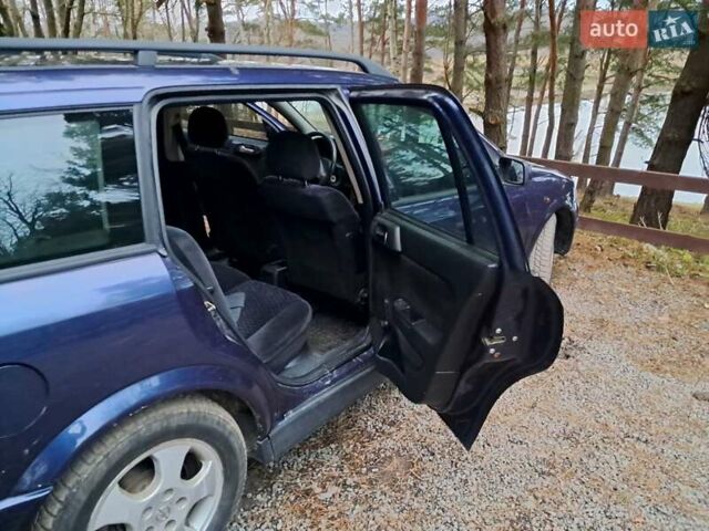 Синий Опель Астра, объемом двигателя 1.8 л и пробегом 480 тыс. км за 2000 $, фото 2 на Automoto.ua