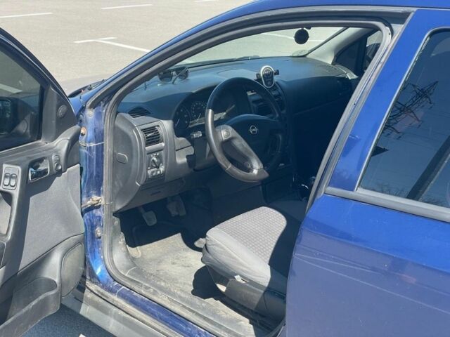 Синий Опель Астра, объемом двигателя 2 л и пробегом 320 тыс. км за 1200 $, фото 2 на Automoto.ua