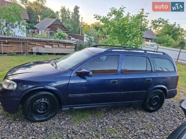 Синий Опель Астра, объемом двигателя 2 л и пробегом 350 тыс. км за 2600 $, фото 13 на Automoto.ua