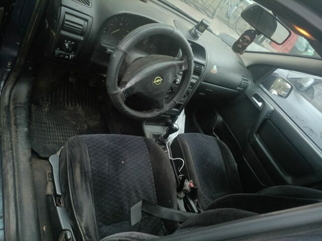 Синій Опель Астра, об'ємом двигуна 2 л та пробігом 323 тис. км за 2050 $, фото 5 на Automoto.ua