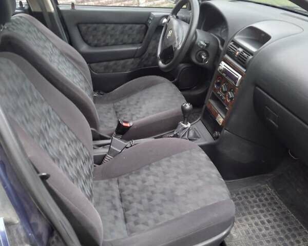 Синий Опель Астра, объемом двигателя 2 л и пробегом 225 тыс. км за 3000 $, фото 7 на Automoto.ua
