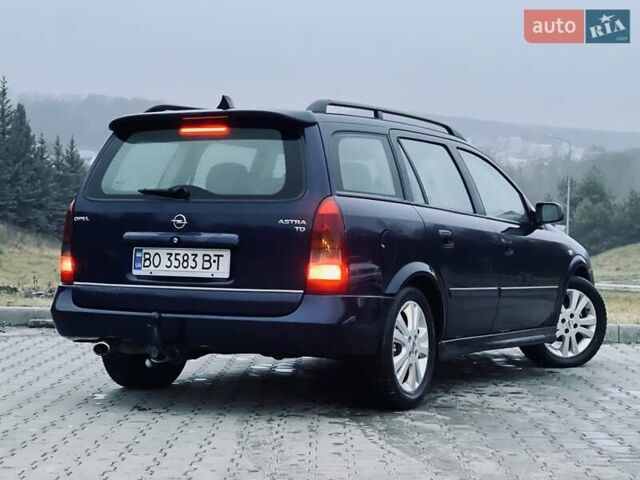 Синий Опель Астра, объемом двигателя 1.7 л и пробегом 270 тыс. км за 2799 $, фото 13 на Automoto.ua