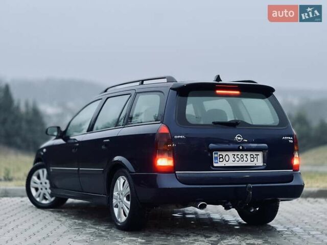 Синий Опель Астра, объемом двигателя 1.7 л и пробегом 270 тыс. км за 2799 $, фото 8 на Automoto.ua