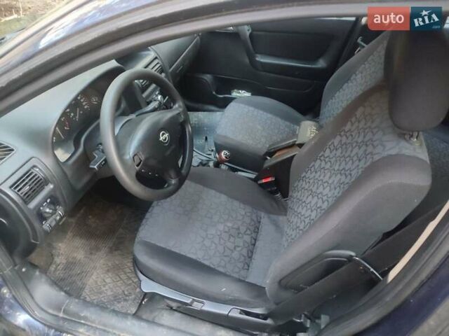 Синій Опель Астра, об'ємом двигуна 2 л та пробігом 350 тис. км за 1500 $, фото 2 на Automoto.ua