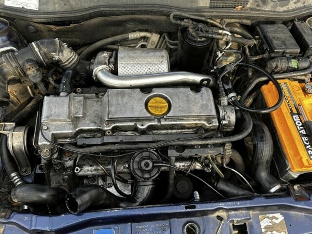 Синий Опель Астра, объемом двигателя 2 л и пробегом 300 тыс. км за 1650 $, фото 5 на Automoto.ua