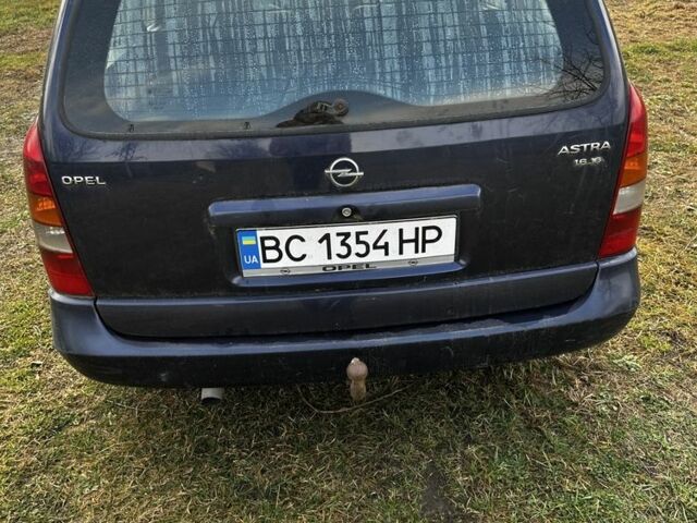 Синий Опель Астра, объемом двигателя 2 л и пробегом 300 тыс. км за 1650 $, фото 3 на Automoto.ua