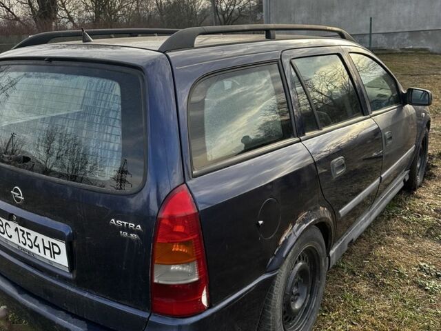 Синий Опель Астра, объемом двигателя 2 л и пробегом 300 тыс. км за 1650 $, фото 2 на Automoto.ua