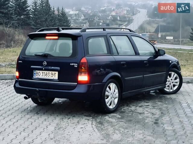 Синий Опель Астра, объемом двигателя 1.7 л и пробегом 270 тыс. км за 2799 $, фото 11 на Automoto.ua