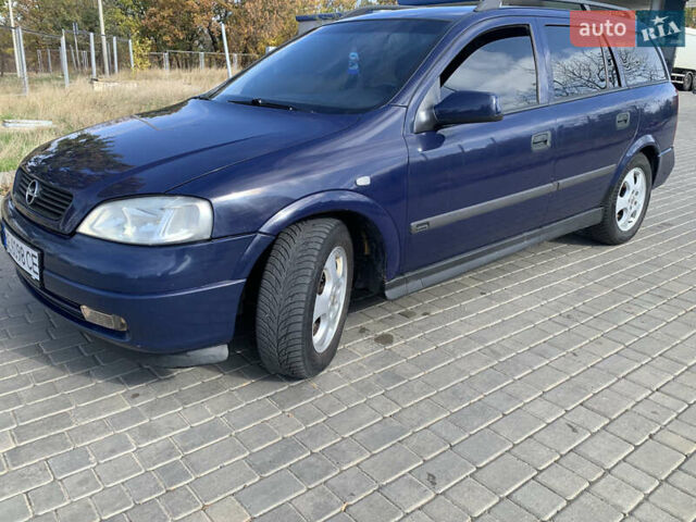 Синий Опель Астра, объемом двигателя 2 л и пробегом 359 тыс. км за 3000 $, фото 3 на Automoto.ua